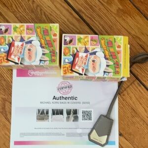 Michael Kors Keychain or low value item follow  IG: AuthenticArchiveAuctions